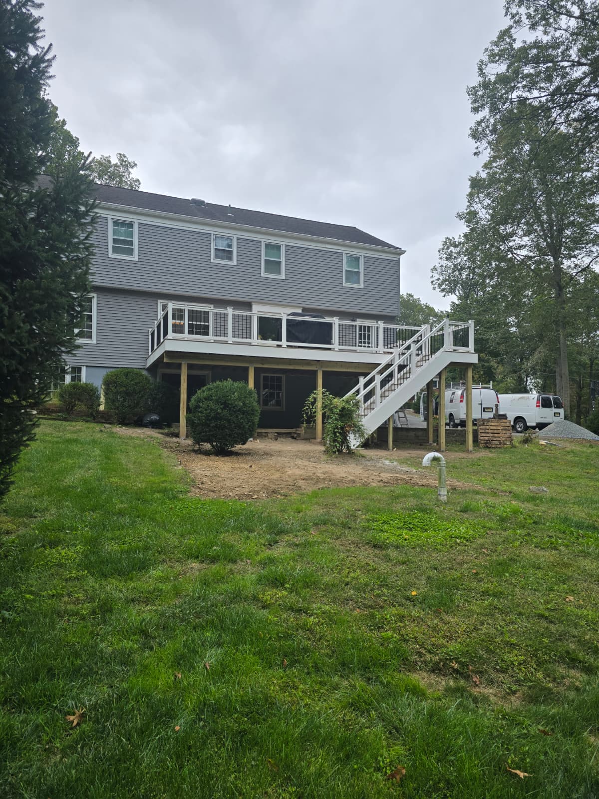 Backyard deck with finished railing and stair detail