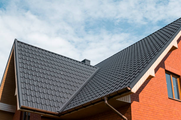 Dark metal roof installation by Perfect Measure Construction