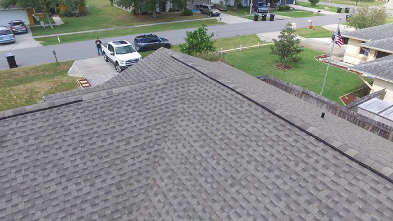 Architectural shingle roof replacement photographed from above in a New Jersey neighborhood